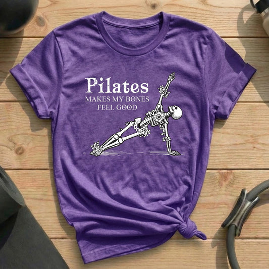 Pilates Makes My Bones Feel Good Skeleton Heather Team Purple Tshirt in MindCloth Pilates Tshirt Collection