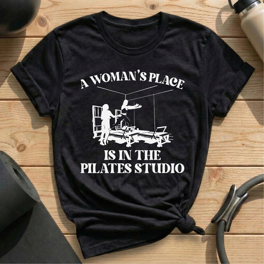 A Woman’s Place Is in the Pilates Studio Black T-shirt in MindCloth Pilates Tshirt Collection