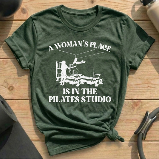 A Woman’s Place Is in the Pilates Studio Heather Forest T-shirt in MindCloth Pilates Tshirt Collection